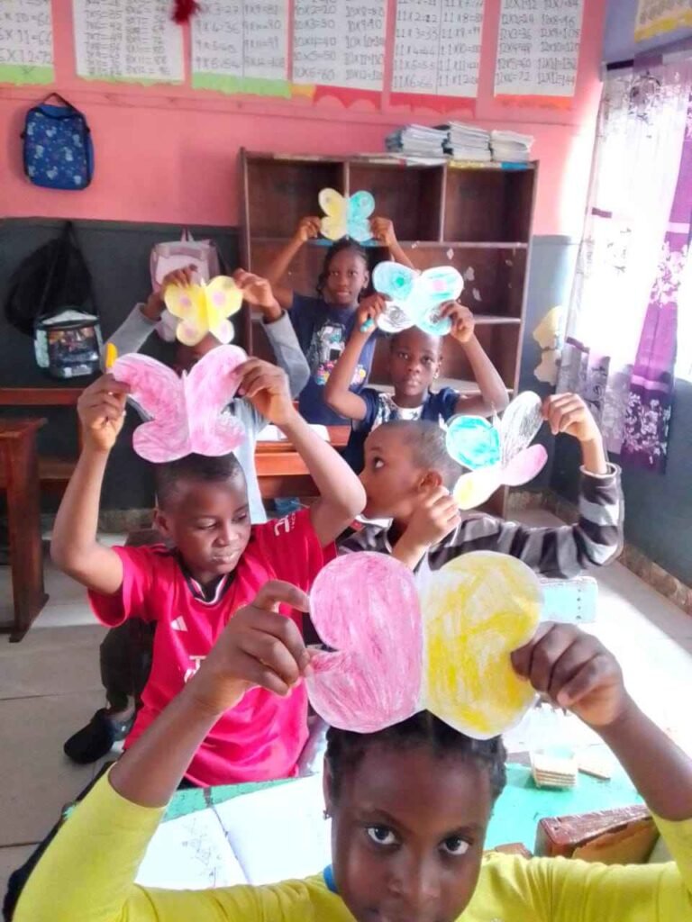 Butterfly crafts held up in the classroom