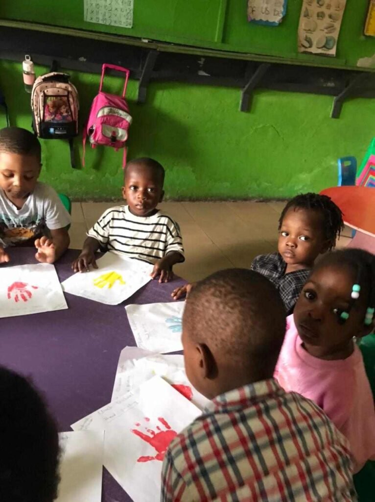 Handprint painting in the nursery class