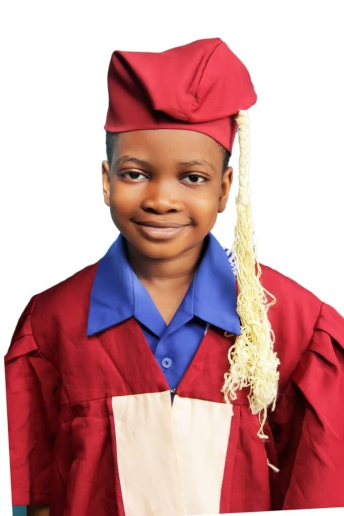 A graduating pupil in cap and gown