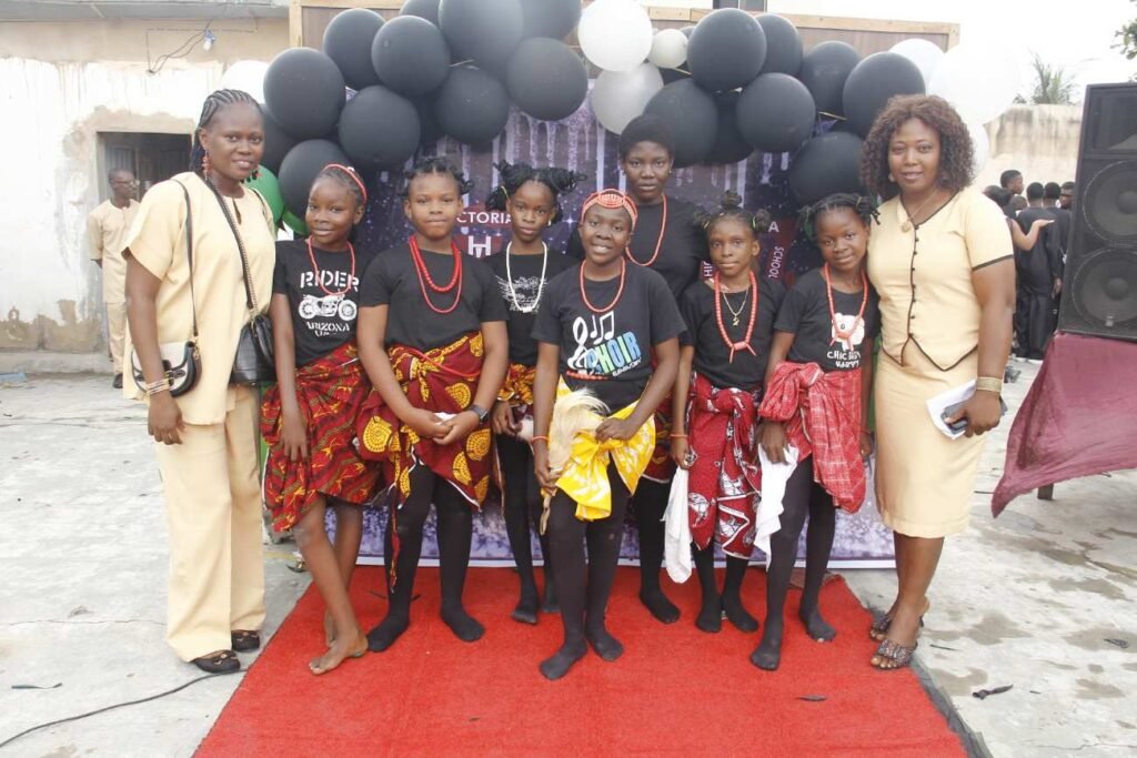 Victoria Schools pupils in traditional dress with staff on Cultural Day