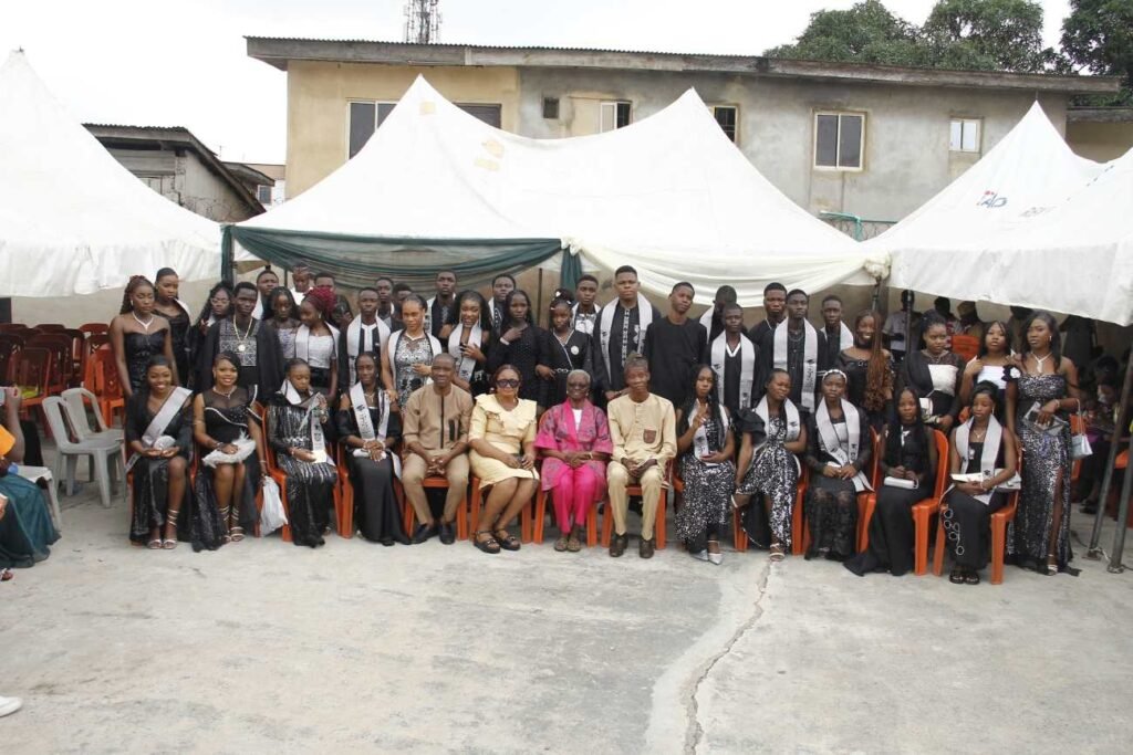 Victoria Schools staff and graduating students together on campus