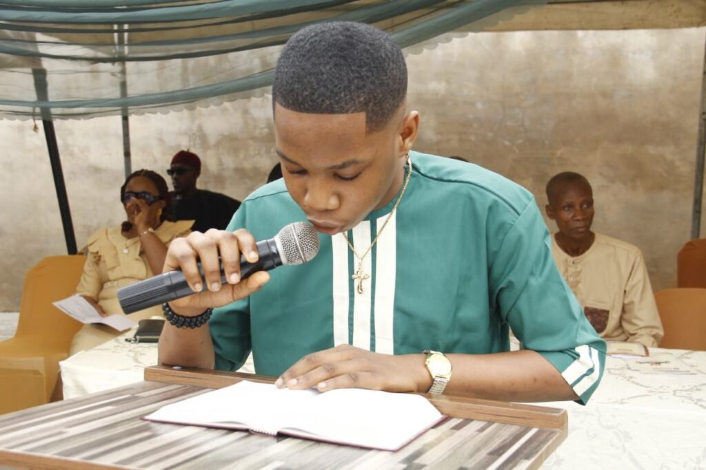 A Victoria High School student reading at the valedictory ceremony